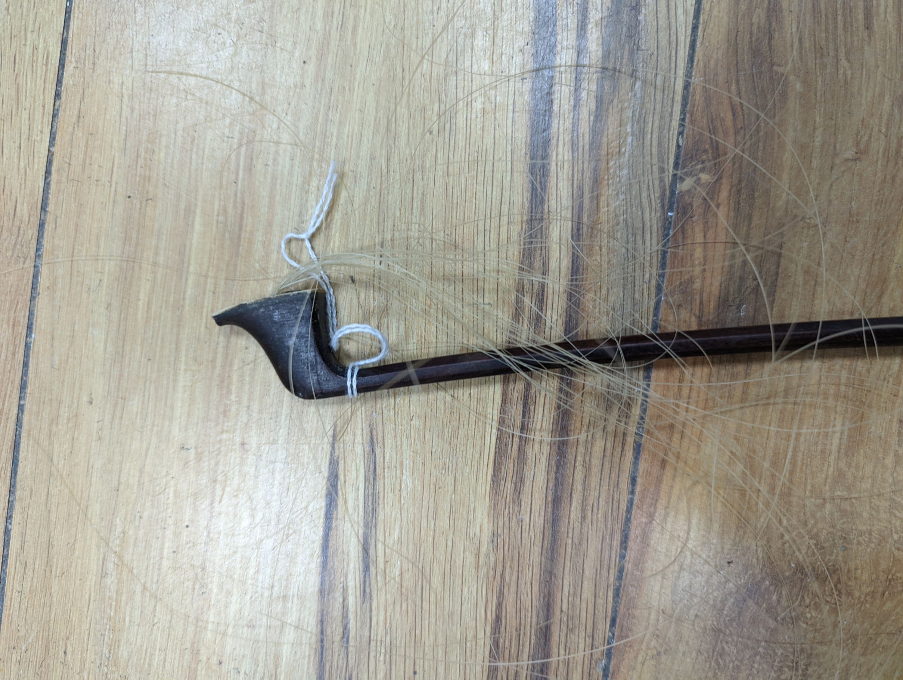 A violin and bow, various records etc